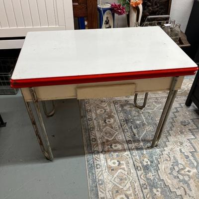 Sale Photo Thumbnail #800: Vintage Enamel Top Table with pull out leafs.  See photos for condition.