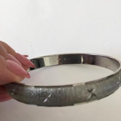 Monet Silver-tone starburst bangle bracelet