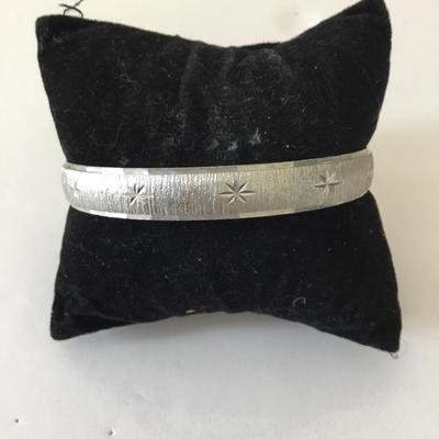 Monet Silver-tone starburst bangle bracelet