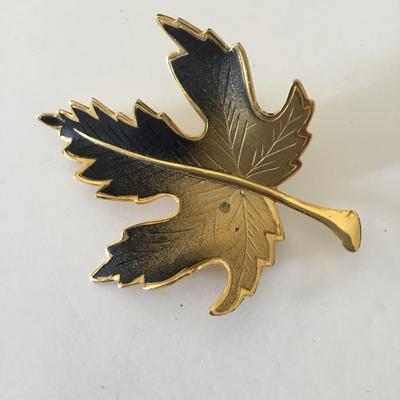 Maple leaf brooch, black and gold 1970s brooch