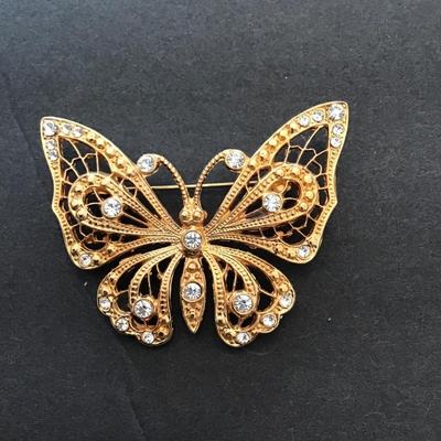 Gold tone, butterfly, lapel pin with rhinestones