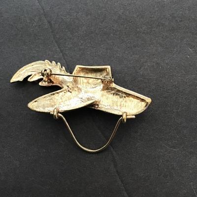 Red enamel hat lapel pin