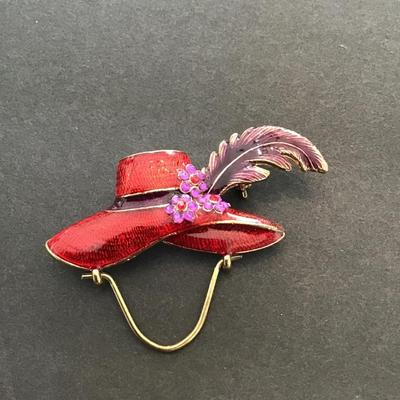 Red enamel hat lapel pin
