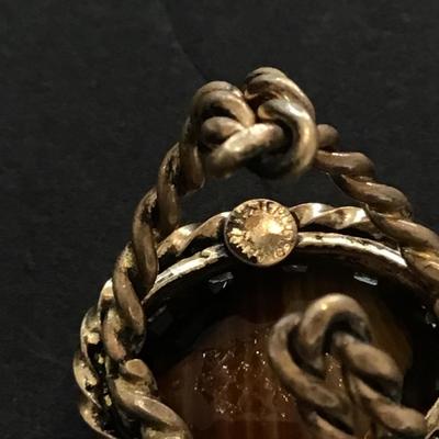 Sale Photo Thumbnail #11: Vintage 1960s made in West Germany tigers eye ring. Please see attached photos.
