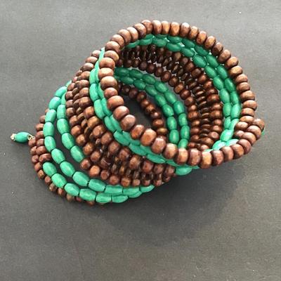 Sale Photo Thumbnail #43: Wooden beaded coil bracelet. Please see attached  photos.