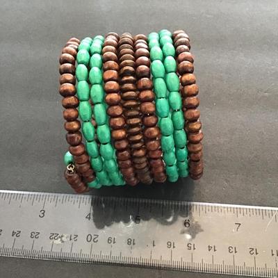 Sale Photo Thumbnail #42: Wooden beaded coil bracelet. Please see attached  photos.