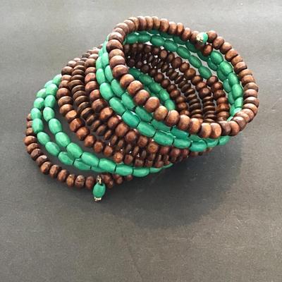 Sale Photo Thumbnail #41: Wooden beaded coil bracelet. Please see attached  photos.