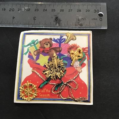 Sale Photo Thumbnail #79: Vintage card of Christmas pins. Please see attached photos.