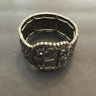 Sale Photo Thumbnail #92: Brushed bronze, black, stretchy bracelet. Please see attached photos.