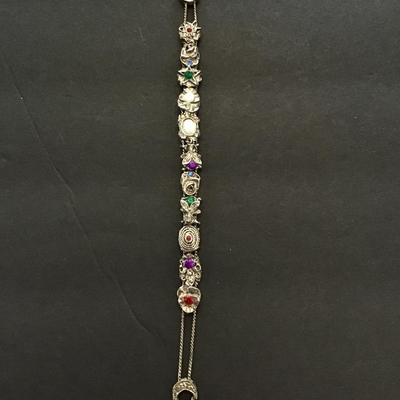 Sale Photo Thumbnail #126: Silvertone bracelet with multicolored rhinestones. Please see attached photos.