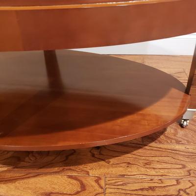 Two Tiered Wooden Oval Table on Wheels