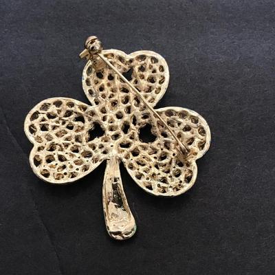 Sale Photo Thumbnail #146: Gold tone, green rhinestone, lapel, pin clover brooch please see attached photos
