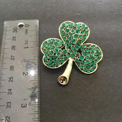 Sale Photo Thumbnail #145: Gold tone, green rhinestone, lapel, pin clover brooch please see attached photos