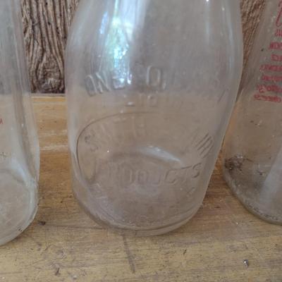 Set of Four Vintage Painted Logo One Quart Dairy Milk Bottles Peeler, Cedar Valley, Guilford, Highs Quality Milk (#50)