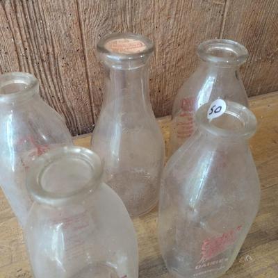Set of Four Vintage Painted Logo One Quart Dairy Milk Bottles Peeler, Cedar Valley, Guilford, Highs Quality Milk (#50)