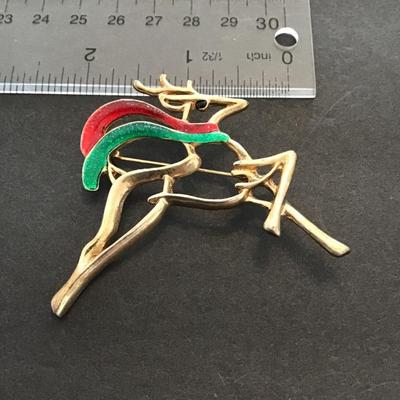 Sale Photo Thumbnail #192: Gold tone, Christmas reindeer. Please see attached photos.