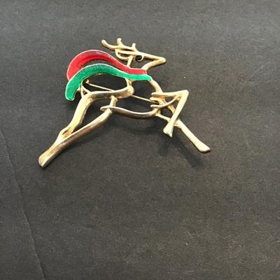 Sale Photo Thumbnail #190: Gold tone, Christmas reindeer. Please see attached photos.
