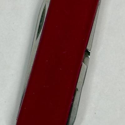 Sale Photo Thumbnail #3: Tools include knife blade, nail file, scissors and pull-out toothpick.  Very good used condition.