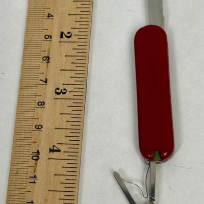 Sale Photo Thumbnail #2: Tools include knife blade, nail file, scissors and pull-out toothpick.  Very good used condition.