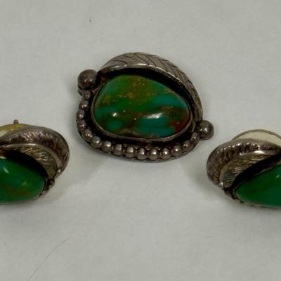 Sale Photo Thumbnail #7: Looks to be Royston Turquoise in Silver, possible Navajo origin but markings could not be traced.  Great set, good condition.