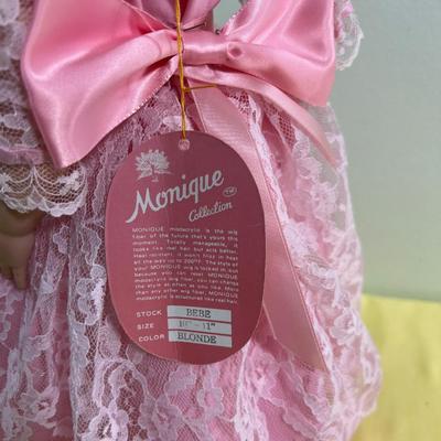 Porcelain Doll Named BEBE W/Stand  (Pink) 