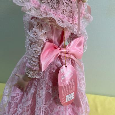 Porcelain Doll Named BEBE W/Stand  (Pink) 