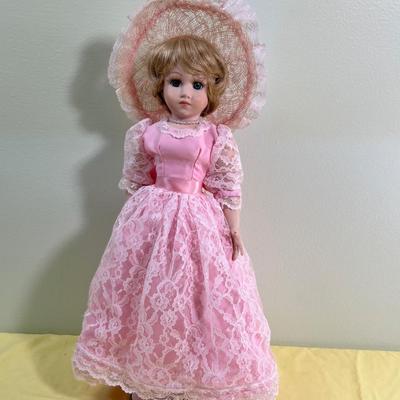 Porcelain Doll Named BEBE W/Stand  (Pink) 