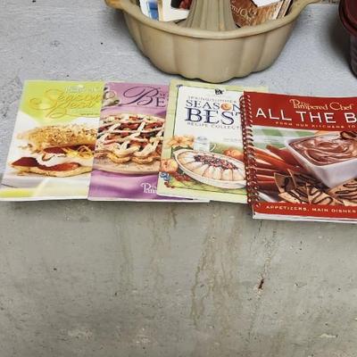 Sale Photo Thumbnail #461: Lots of seasons best booklets, a Bundt pan that has been used and a brand new large roaster