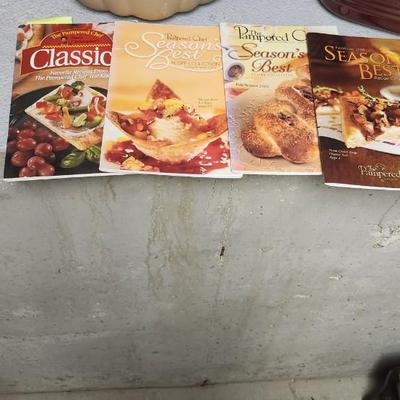 Sale Photo Thumbnail #462: Lots of seasons best booklets, a Bundt pan that has been used and a brand new large roaster