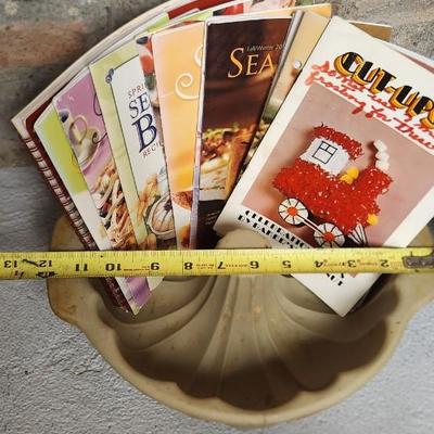 Sale Photo Thumbnail #465: Lots of seasons best booklets, a Bundt pan that has been used and a brand new large roaster