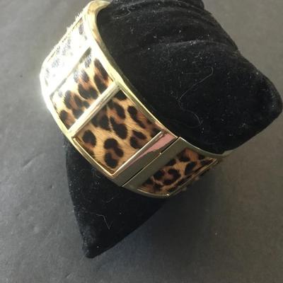 Gold tone, cheetah bangle bracelet