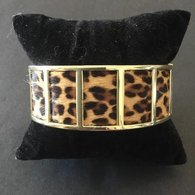 Gold tone, cheetah bangle bracelet