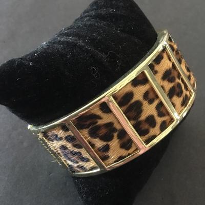 Gold tone, cheetah bangle bracelet