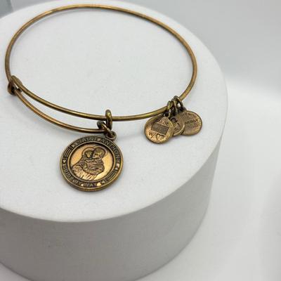 LOT 90J: Alex and Ani Charm Bracelets: Capricorn, Young & Strong, Paw Print & More