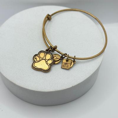 LOT 90J: Alex and Ani Charm Bracelets: Capricorn, Young & Strong, Paw Print & More