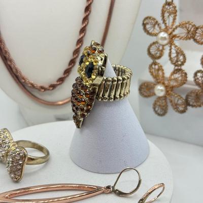 LOT 93J: Rose Gold Chains, Flower Wire Pierced Earrings, Owl Stretch Ring & More