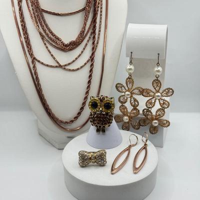 LOT 93J: Rose Gold Chains, Flower Wire Pierced Earrings, Owl Stretch Ring & More