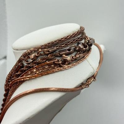 LOT 93J: Rose Gold Chains, Flower Wire Pierced Earrings, Owl Stretch Ring & More