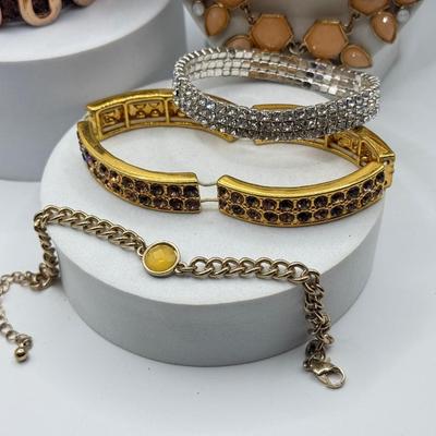 LOT 100J: "TOUGH" & "INSPIRE" Bracelets, Necklaces & More