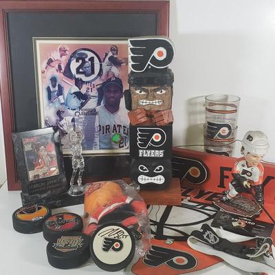 LOT 108B: Collection of Flyers Memorabilia with Framed Roberto Clemente Collage & Lebron James Card Display