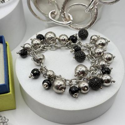 LOT 121J: Silvertone Jewelry - Peace Sign Hoops, Necklaces & More
