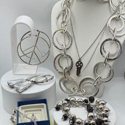 LOT 121J: Silvertone Jewelry - Peace Sign Hoops, Necklaces & More