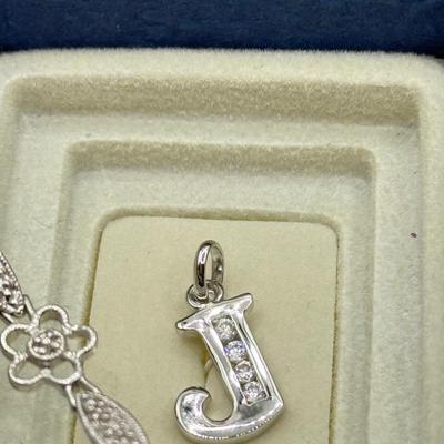 LOT 121J: Silvertone Jewelry - Peace Sign Hoops, Necklaces & More