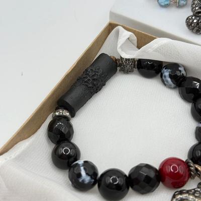 LOT 123J: Beaded Bracelet w/ Buddha Charm & Rings