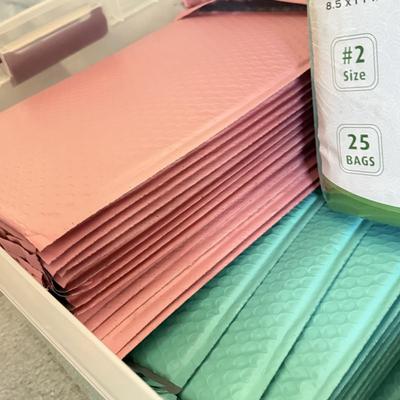 LOT 135U: Bin of Unused Bubble Mailers & Tie Dye Essentials