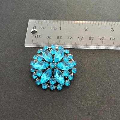 Beautiful, silver tone, blue rhinestone brooch