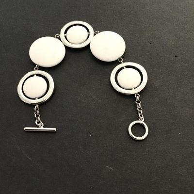 Silvertone white plastic disc fashion bracelet