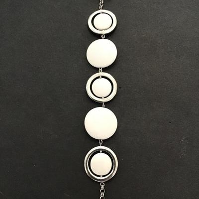 Silvertone white plastic disc fashion bracelet