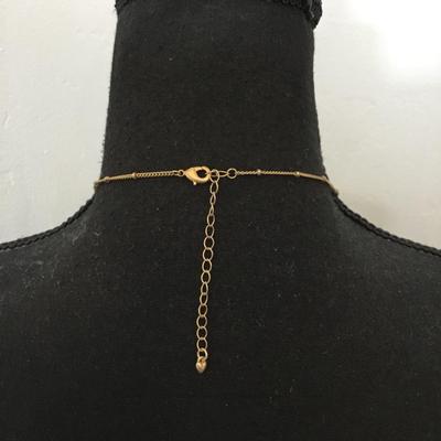 Beautiful satin, gold tone, stone circular pendant necklace