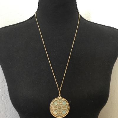 Beautiful satin, gold tone, stone circular pendant necklace